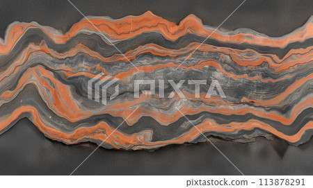 Layered stone texture in earth tones with wavy patterns and bands. 113878291