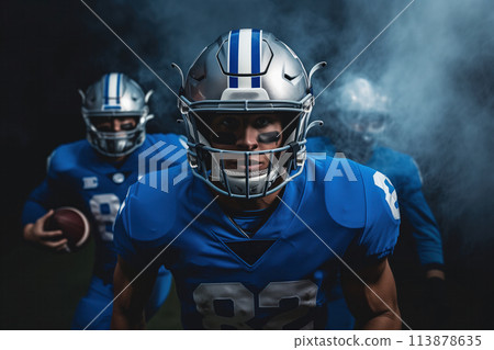 Dynamic Football Players Entering the Field with Intense Focus. 113878635