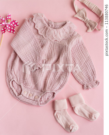 Set of pink clothes and accessories for newborn baby. Set of pink clothes and accessories for newborn baby. 113880746