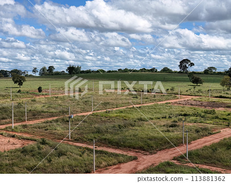 ew subdivision for houses, dirt road and power poles ew subdivision for houses, dirt road and power poles 113881362