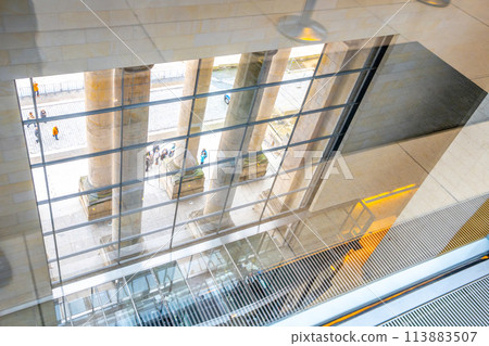 A look at the Reichstag building in Berlin, Germany, taken from inside, showcasing the architectural details through a clear glass window. A look at the Reichstag building in Berlin, Germany, taken from inside, showcasing the architectural details through a clear glass window. 113883507