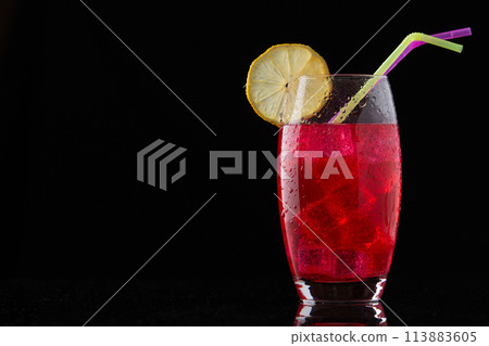 glass with red drink with ice glass with red drink with ice 113883605