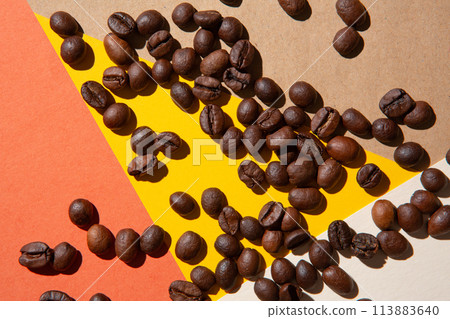 Coffee beans viewed from above on a background of different colors 113883640