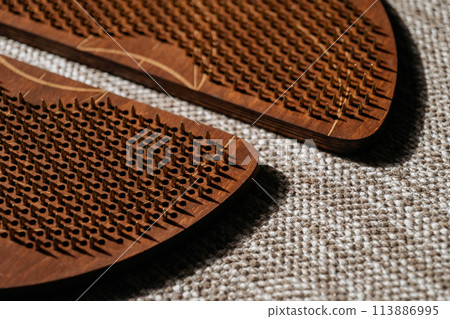 Crafted wooden acupressure sadhu boards with intricate peg patterns Crafted wooden acupressure sadhu boards with intricate peg patterns 113886995
