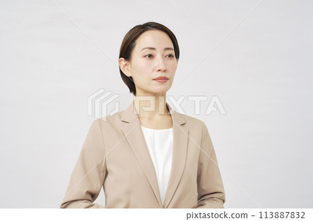 Middle-aged business woman portrait white background Middle-aged business woman portrait white background 113887832