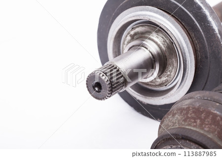 Car spare part - wheel drive cv joint on white isolated background. Catalog of spare parts for car service. 113887985