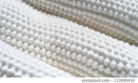 Beige soccer fabric texture with air mesh. Sportswear background 113890410