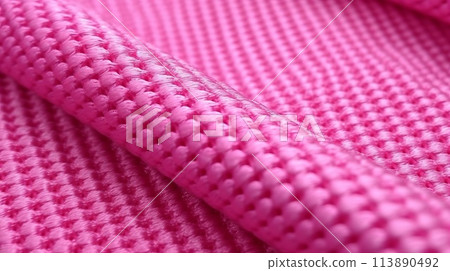 Pink soccer fabric texture with air mesh. Athletic wear backdrop Pink soccer fabric texture with air mesh. Athletic wear backdrop 113890492