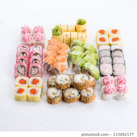 Japanese food restaurant, sushi maki gunkan roll plate or platter set. Sushi set and composition Japanese food restaurant, sushi maki gunkan roll plate or platter set. Sushi set and composition 113892577
