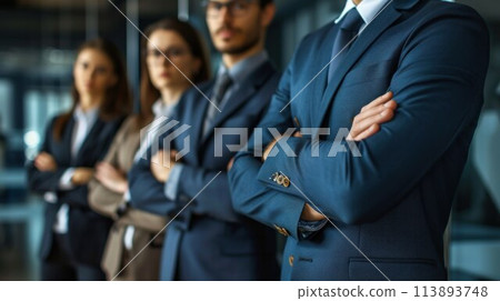 Businessmen with arms folded standing in office 113893748