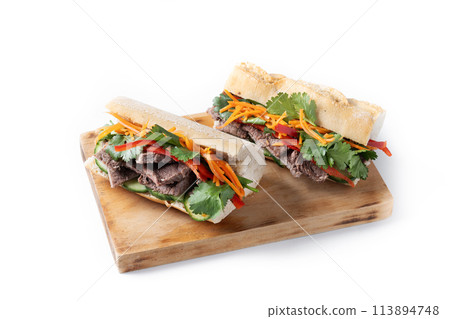 Vietnamese banh mi sandwich isolated on white background Vietnamese banh mi sandwich isolated on white background 113894748