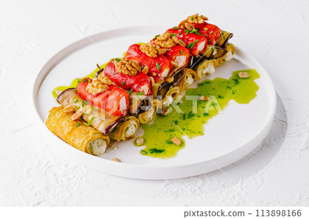Gourmet stuffed chicken roll with vegetables and nuts Gourmet stuffed chicken roll with vegetables and nuts 113898166