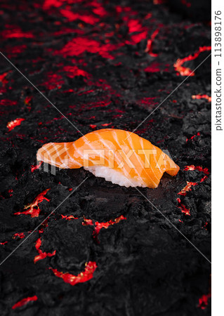 Sushi on lava texture background 113898176