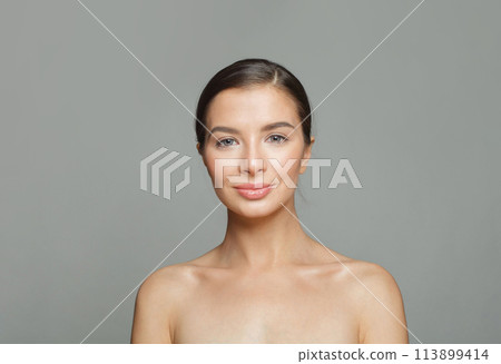 Elegance healthy model woman with beautiful skin and cute smile on white background, studio portrait Elegance healthy model woman with beautiful skin and cute smile on white background, studio portrait 113899414