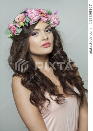 Attractive fashion brunette model with make-up, fresh clear skin, shiny long wavy hairstyle Attractive fashion brunette model with make-up, fresh clear skin, shiny long wavy hairstyle 113899597