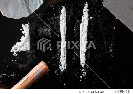 Two Cocaine lines prepared on a table Two Cocaine lines prepared on a table 113899648