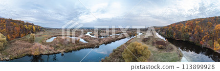 Aerial panorama on river curve in autumn valley Aerial panorama on river curve in autumn valley 113899928