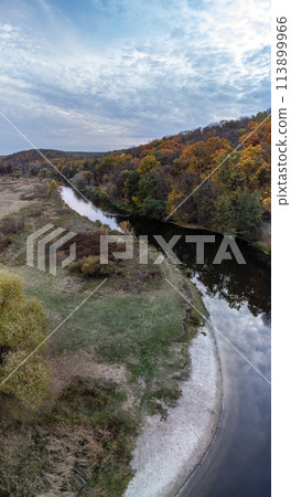 Aerial river curve with autumn forest Aerial river curve with autumn forest 113899966