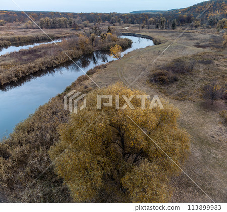 Aerial river curve in autumn valley 113899983