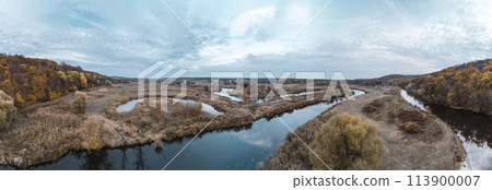 Aerial panorama on river curve in autumn valley 113900007