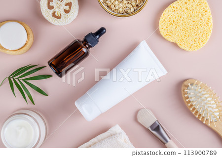 Natural eco friendly beauty skin care products with white tube mockup flat lay on beige background 113900789
