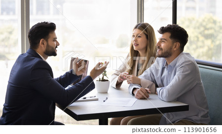 Positive married couple consulting financial expert, real estate agent Positive married couple consulting financial expert, real estate agent 113901656