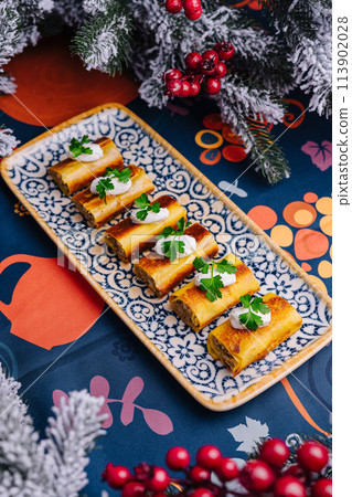 Festive holiday appetizers on ornate serving tray Festive holiday appetizers on ornate serving tray 113902028