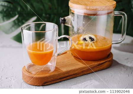 Freshly blended fruit smoothie pouring into glass Freshly blended fruit smoothie pouring into glass 113902046