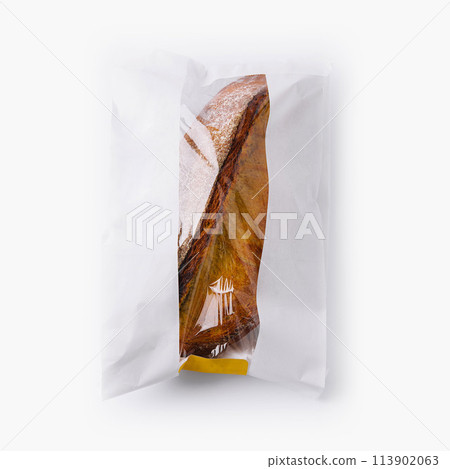 Bread in paper bag on white background 113902063