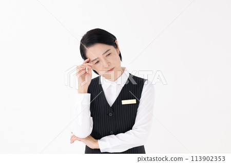 Woman in uniform worried 113902353