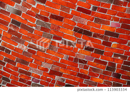 Textured Red and Pink Brick mosaic Wall Close-up View 113903334