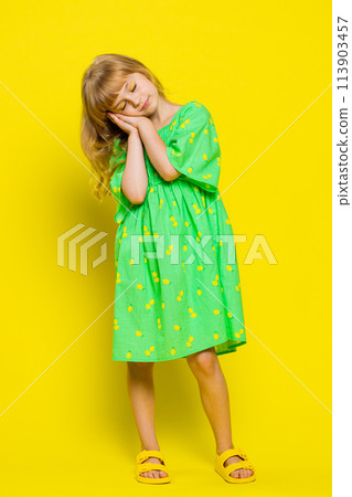 Tired sleepy child girl kid yawning feeling somnolent lazy bored gaping suffering from lack of sleep Tired sleepy child girl kid yawning feeling somnolent lazy bored gaping suffering from lack of sleep 113903457