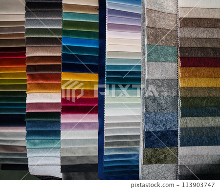 Multi-colored fabric background. Multi-colored fabric for furniture 113903747