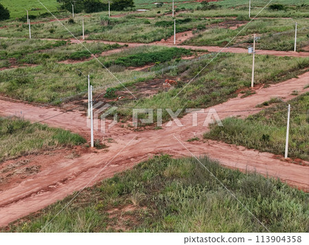 ew subdivision for houses, dirt road and power poles 113904358