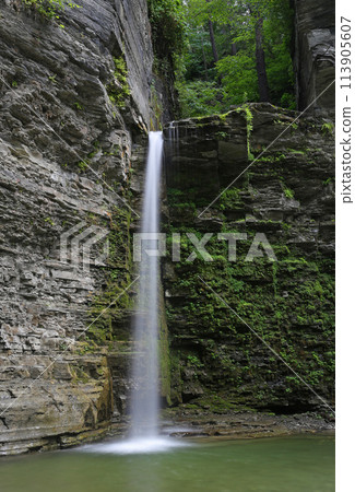 A scenic view of Eagle Cliff Falls near Watkins Glen park, New York. A scenic view of Eagle Cliff Falls near Watkins Glen park, New York. 113905607