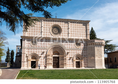 Beautiful Romanesque portal of the basilica Santa Maria di Collemaggio in L'Aquila, Italy 113905768