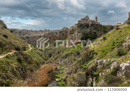 Hiking through the canyon in Matera, Southern Italy 113906000