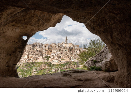 Scenic view of historic downtown with its cathedral, photo taken from a cave house, Southern Italy Scenic view of historic downtown with its cathedral, photo taken from a cave house, Southern Italy 113906024