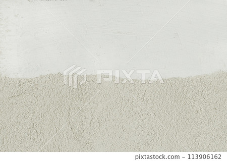 Two colors wall light white and beige plaster texture wall stucco blank background place text design empty Two colors wall light white and beige plaster texture wall stucco blank background place text design empty 113906162
