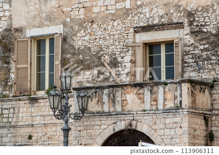 Balcony of an ol stone house in downtown Trani, Italy Balcony of an ol stone house in downtown Trani, Italy 113906311
