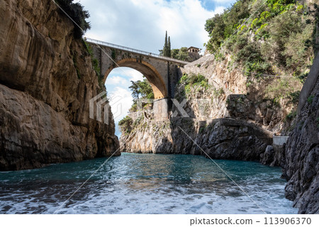 Scenic arch bridge at the Fjord of Fury, Amalfi Coast of Italy 113906370