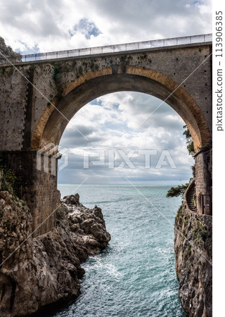 Scenic arch bridge at the Fjord of Fury, Amalfi Coast of Italy 113906385