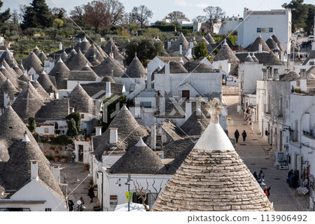 Scenic view over the historic Trulli district in Alberobello, Southern Italy Scenic view over the historic Trulli district in Alberobello, Southern Italy 113906492