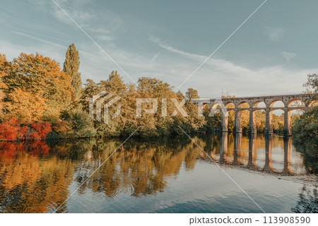 Railway Bridge with river in Bietigheim-Bissingen, Germany. Autumn. Railway viaduct over the Enz River, built in 1853 by Karl von Etzel on a sunny summer day. Bietigheim-Bissingen, Germany. Old Railway Bridge with river in Bietigheim-Bissingen, Germany. Autumn. Railway viaduct over the Enz River, built in 1853 by Karl von Etzel on a sunny summer day. Bietigheim-Bissingen, Germany. Old 113908590