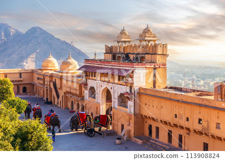 Elephant riders in Amber Fort, famous tourist attraction of Jaipur, India Elephant riders in Amber Fort, famous tourist attraction of Jaipur, India 113908824