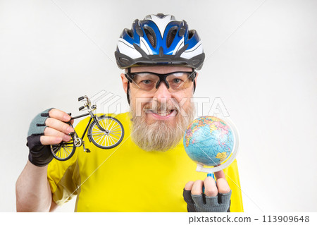 Cyclist with world globe model and bicycle. Bike travel to different countries. 113909648