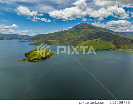 Aerial drone of lake Toba lies in the northern part of Barisan Mountain Range. Sumatra, Indonesia. Aerial drone of lake Toba lies in the northern part of Barisan Mountain Range. Sumatra, Indonesia. 113909780