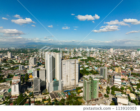 Top view of Manila is the capital of the Philippines, with modern buildings and skyscrapers. 113910303
