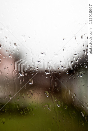 Raindrops on glass. Weather conditions, cold and humidity Raindrops on glass. Weather conditions, cold and humidity 113910667