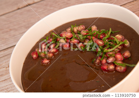 LEBANESE RECIPE, MOUJADARA, LENTIL PUREE, RICE, ONIONS AND POMEGRANATE SEEDS 113910750